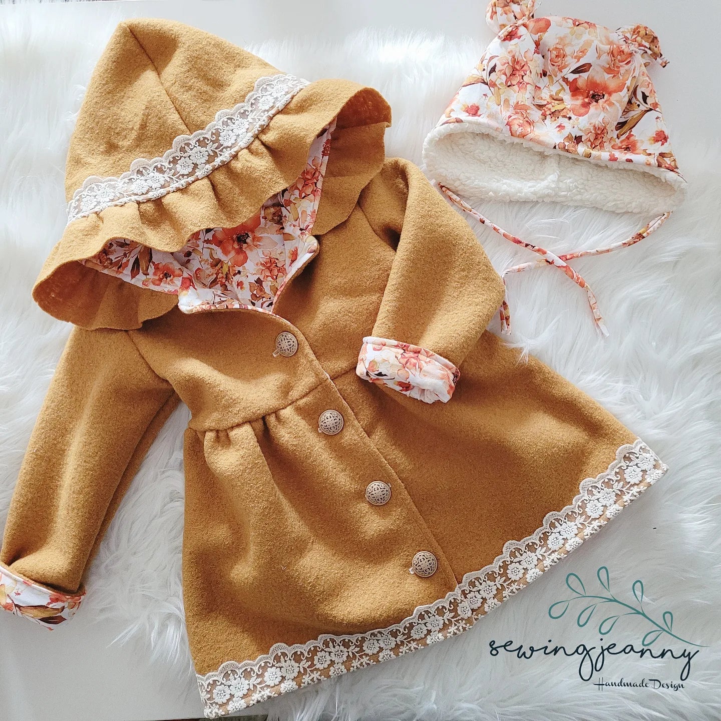 Cardigan + Bärchen Mütze o. Turban zum halben Preis