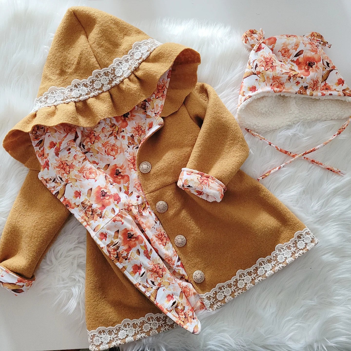 Cardigan + Bärchen Mütze o. Turban zum halben Preis