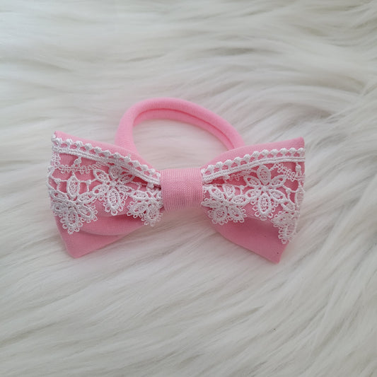 Bonbon rosa Haarschleife mittel mit haargummi 9